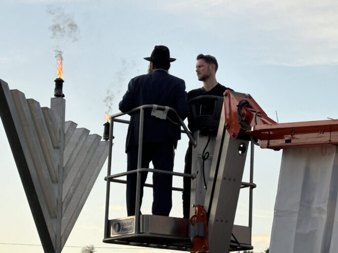 Lighting the first candle for Hanukkah